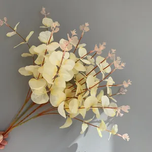 Detailed close-up of 16-fork artificial cream eucalyptus leaves with soft pink tips