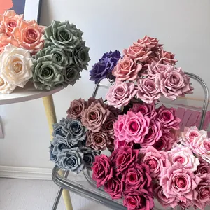 Macro view of assorted 7-head artificial rose bouquets for home and wedding decor