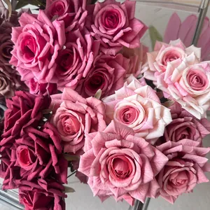 Close-up detail showing realistic textures of pink and burgundy artificial rose petals