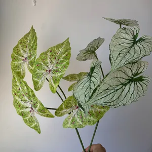 Detailed macro view of 3D printed artificial Caladium leaves for home and wedding decor