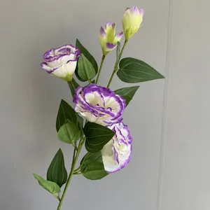 Close-up view of elegant artificial purple and white lisianthus flowers for wedding decor