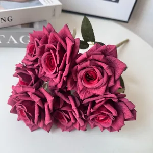 Detailed texture of burgundy artificial 7-head rose bouquet for home decoration