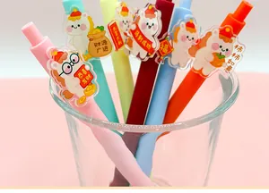 Close-up detail of Year of the Horse retractable gel pens with cute horse acrylic charms