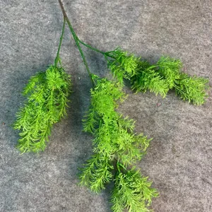 Close-up of lush artificial green foliage spray for French Monet style wedding decor