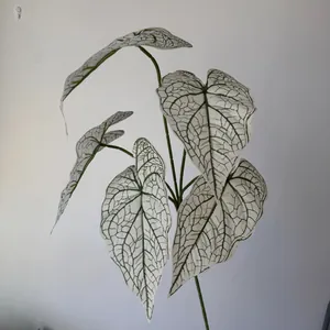 Close-up view of a realistic 3D printed artificial Caladium leaf with green veins