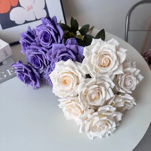 Detailed close-up showing the realistic texture of purple and cream artificial roses