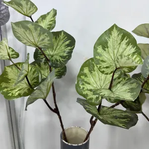 Close-up of artificial variegated green lotus leaves for Nordic home decoration