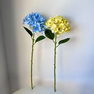 Detailed view showing the realistic texture of blue and yellow silk hydrangea flower heads