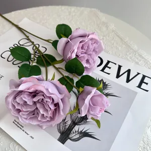 Detailed texture of purple Austin rose petals on a decorative artificial flower stem