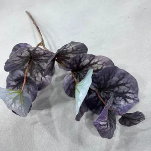 Detailed macro view of artificial purple lotus leaves featuring unique marble vein patterns