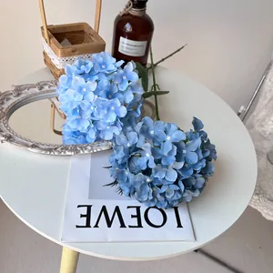 Realistic 20cm blue artificial hydrangea stems for elegant wedding and home interior decor.