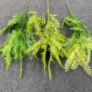 Detailed texture of artificial forest-style fern leaves for wedding decor