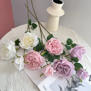 Detailed macro view of elegant artificial Austin roses in white, pink, and purple tones.