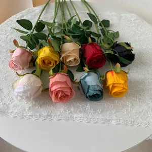 Detailed view of lifelike multi-colored artificial Bulgaria roses for home and hotel decoration