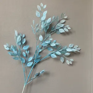 Detailed spray-painted light blue artificial ficus leaves for wedding decor