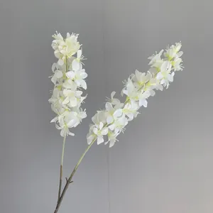 Detailed macro view of artificial white hyacinth flowers with two branches for decor