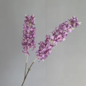 Detailed view of artificial purple hyacinth with two forks for elegant wedding decoration.