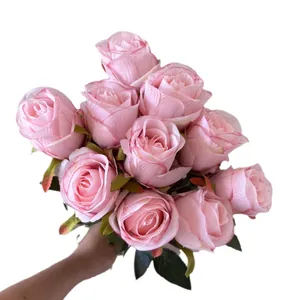 Elegant bouquet of pink artificial Bulgarian roses for home and hotel decoration