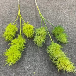 Detail of artificial forest-style greenery stems for wedding decor flower arrangements
