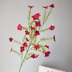 Detailed shot of artificial pink Vinca flowers for pastoral wedding or home decor.