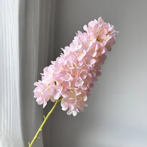 Detailed macro shot of a tall pink artificial pagoda hydrangea stem for home decor