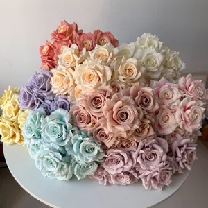 A detailed view of colorful 7-head silk diamond roses for wedding and home decoration