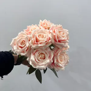 Detail view of a 9-head champagne pink artificial rose bouquet with realistic silk petals