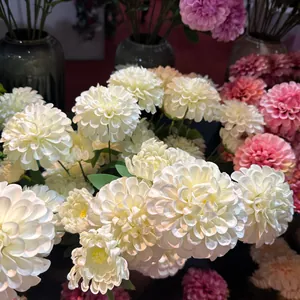 Detailed macro view of white 3-head artificial silk flowers for wedding decoration