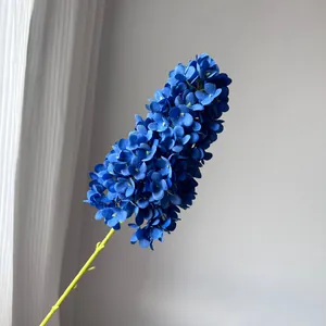 Macro view of dense blue tower hydrangea artificial flower petals with fine silk texture