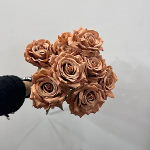 Close-up of 9-head terracotta silk rose bouquet for elegant hotel decoration