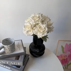 Elegant 7-head white artificial roses in a black ribbed vase for cozy home decor