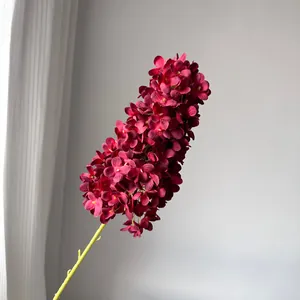 Close-up of deep red artificial pagoda hydrangea with dense petal arrangement.
