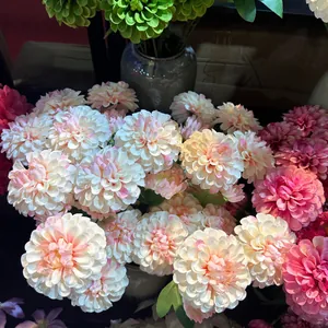 Detailed view of realistic pink and white artificial silk dahlia flower bouquet