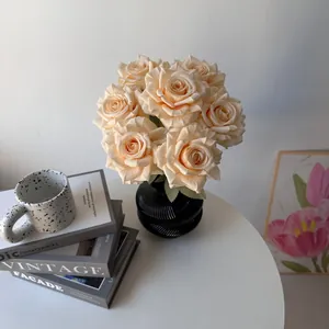Close-up of 7-head champagne silk roses in black ribbed vase for home decor