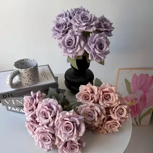 Macro detail of realistic 7-head silk diamond roses in purple and dusty rose tones