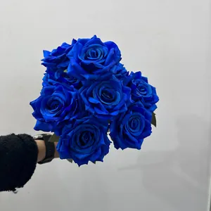 Detailed close-up of a 9-head deep blue artificial rose bouquet for elegant decoration