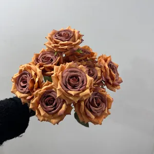 Macro detail of artificial 9-head rose bouquet with vintage burnt orange silk petals