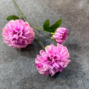 Macro view of realistic 3-head pink artificial silk flowers for elegant home decor
