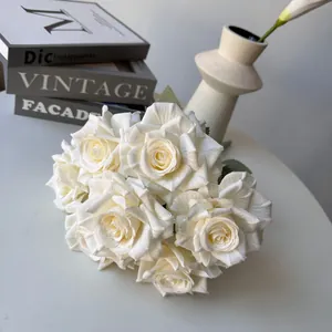 Detailed macro view of ivory white artificial silk roses for wedding and home decoration