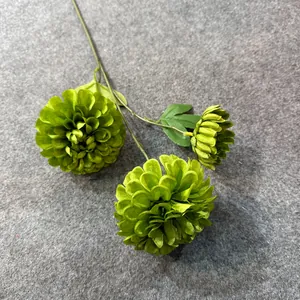 Close-up of three-headed green artificial silk flower stem for home and wedding decor
