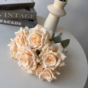 Close-up view of 7-head champagne silk roses bouquet for elegant home and wedding decor