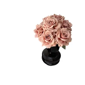 Elegant 7-head dusty pink artificial roses in a black ribbed glass vase for decor.