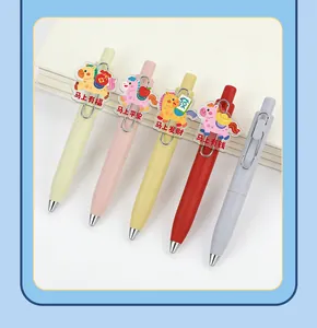Close-up detail of cute horse-themed gel pens with colorful fat barrels and charms.