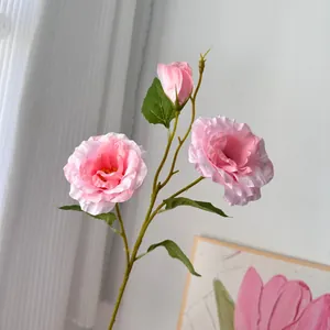 Macro view of pink artificial lisianthus flowers featuring delicate petals and green stems