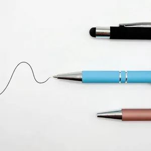 Retractable metal ballpoint pens in multiple colors on a clean white background set