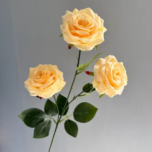 Realistic 3-head yellow artificial rose with decorative water droplets on petals.