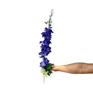 Single branch of vibrant blue artificial delphinium flower for wedding decor