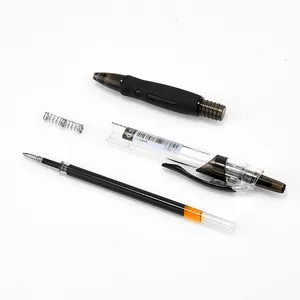 Zerlegter druckkugelschreiber mit feder, gehäuse und schwarzer tintennachfüllung