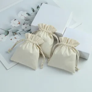 Natural cotton drawstring bags for jewelry storage and gift packaging options