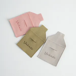 Detailed view of microfiber envelope jewelry pouches with flap and slot closure